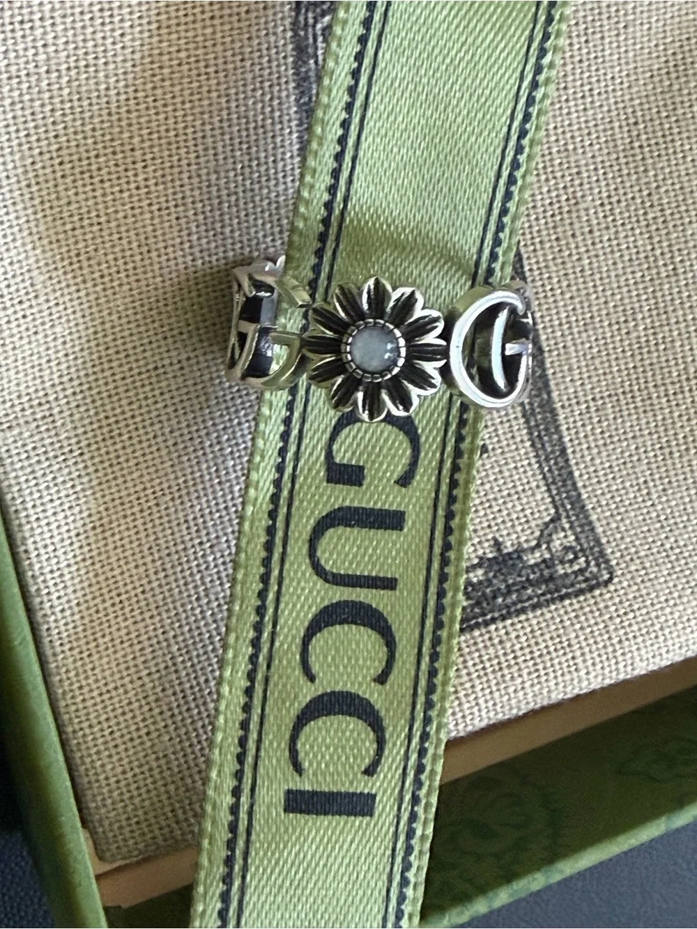Gucci Silver Daisy Logo Ring with Light Green Ribbon